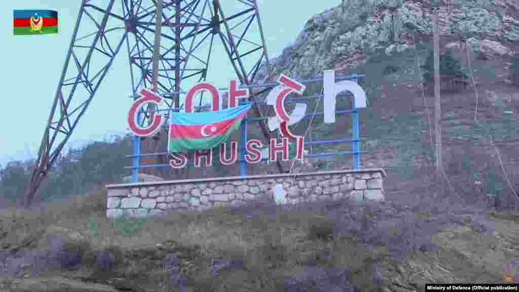 A November 9, 2020 YouTube video from the Azerbaijani Defense Ministry shows an Azerbaijani flag on the Armenian-English signboard for the town of Shushi (Shusha). 