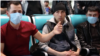 Tajik and other Central Asian migrants were left stranded in Moscow's Domodedovo Airport when COVID-19 restrictions led to the cancellation of their flight home. 