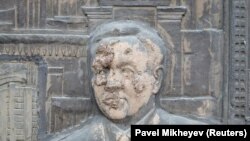 A bas-relief depicting Kazakhstan's first president, Nursultan Nazarbaev, was smeared with mud in Almaty during January 2022 protests triggered by a fuel price increase.