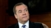 FILE PHOTO: Deputy Chairman of Russia's Security Council Medvedev gives an interview outside Moscow