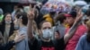 Protesters chanted "Putin resign" and "Putin's a thief" amid a heavy police presence in Pushkin Square.
